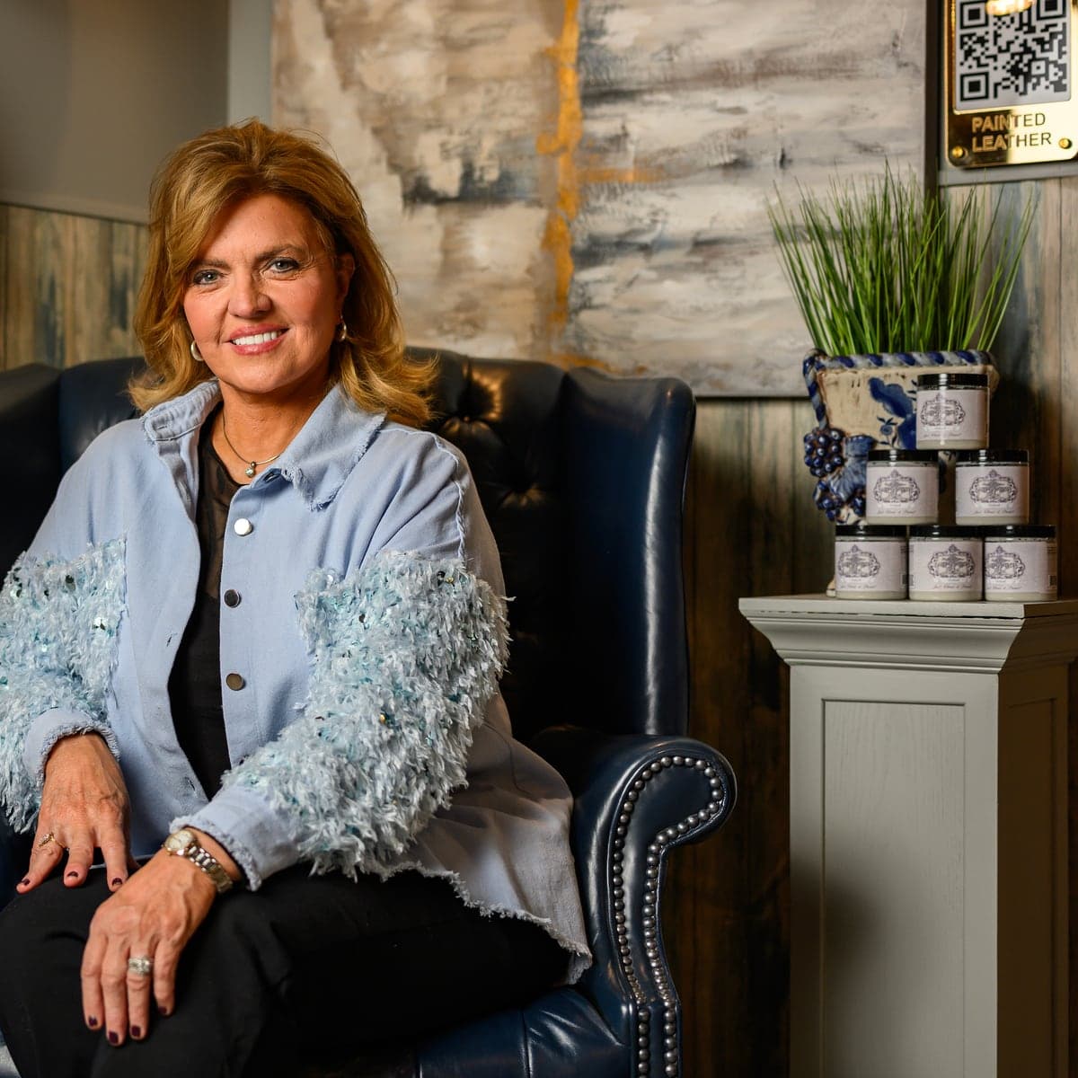Paula Blankenship seated in the Heirloom Traditions Company Store